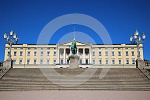 The Royal Palace and statue of King Karl Johan XIV in Oslo, Norw photo