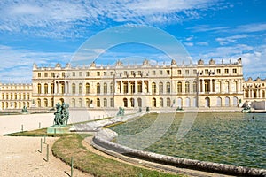 The royal Palace of Versailles near Paris on a beautiful summer day