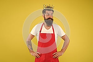 Royal recipe. Man mature cook wear cooking apron and golden crown. Ideas and tips. Chief cook and professional culinary