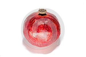 Royal red pomegranate on a white background.