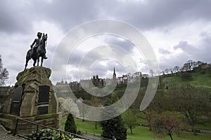 Royal Scots Greys statue, Princes Street Gardens. Edinburgh Castle, back ground photo