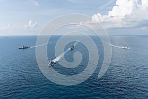 Royal Thai Navy and Royal Australian Navy warships sail in the Gulf of Thailand