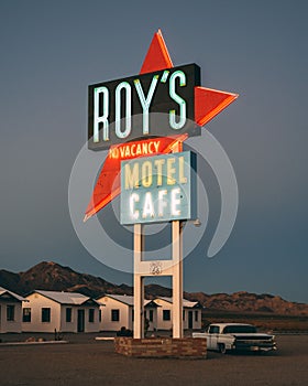 Roys Motel & Cafe neon sign at night, on Route 66 in the Mojave Desert of California