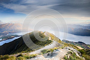 Roys peak mountain hike in Wanaka New Zealand. Popular tourism travel destination. Concept for hiking travel and adventure. New Ze