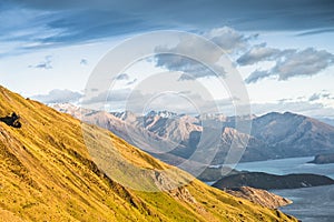 Roys peak mountain hike in Wanaka New Zealand. Popular tourism travel destination. Concept for hiking travel and adventure. New Ze