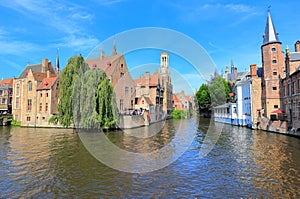 The Rozenhoedkaai canal in Bruges with the belfry in the background. Belgium, Europe.