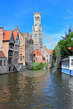 The Rozenhoedkaai canal in Bruges with the belfry in the background. Belgium, Europe.