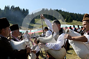 Rhodope bagpipers playing tunes on a Rozhen folklore festival in Bulgaria