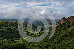 Rozhen pyramids -a unique pyramid shaped mountains cliffs in Bulgaria