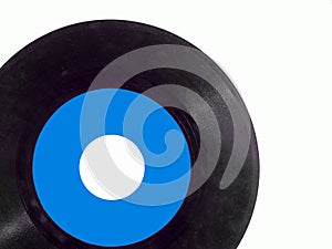 45 rpm vinyl record on a white background with copy space photo