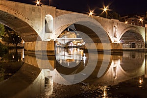 Roma, Bridge on Tiber River with Sant Angelo Castle at Night, with Lights and Reflections