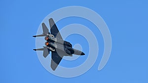 RSAF F-15SG figher jet performing aerobatics at Singapore Airshow