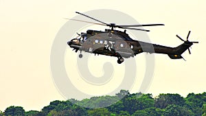 RSAF Super Puma helicopter approaching airfield