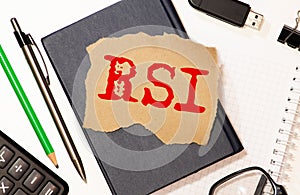 RSI - Relative Strength Index acronym, business concept background