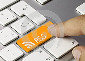 RSS - Inscription on Orange Keyboard Key