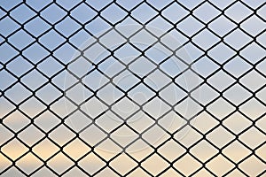 RSteel mesh fence with beautiful sky background