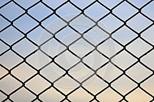 RSteel mesh fence with beautiful sky background
