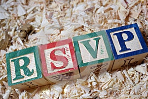 RSVP text on wooden block