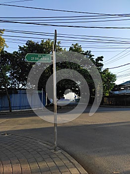 Rua 25 de Abril - street signboard in Dili. photo