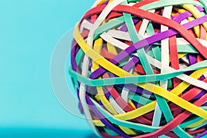 Rubber band ball on blue background
