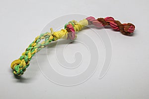 Rubber bands woven into a blowpipe photo