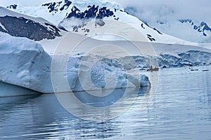 Rubber Boat Glacier Snow Mountains Paradise Bay Skintorp Cove Antarctica