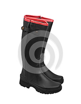 Rubber boots isolate on a white back. Shoes for bad weather or gardening. Shoes of a farmer, hunter or gardener