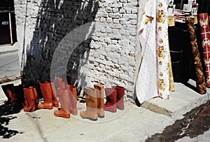 Rubber Boots outside a shop in the sunshine