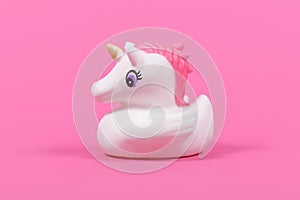 Rubber duck unicorn on pink background