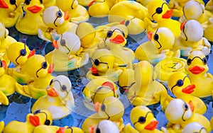 Rubber duckies with glasses at a carnival game