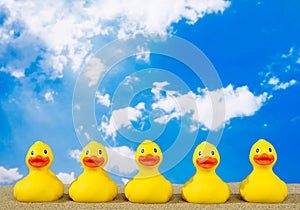 Rubber ducks on beach photo