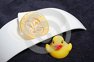 Rubber ducky, soap and towel