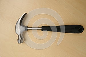 rubber-handled hammer with nail puller, round head for fine work, manual universal percussion tool for driving and extracting