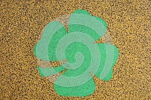 Rubber playground surface with four-leaf clover