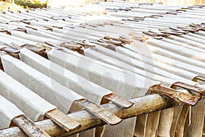 Rubber sheets hang on bamboo hanger