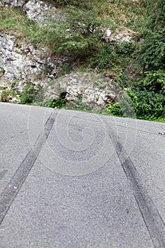 Rubber skid marks from a car crash site