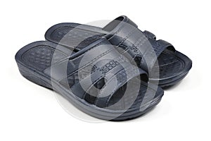 Rubber slippers. Pair of blue flip flops isolated on a white