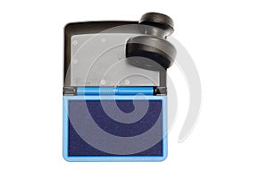 Rubber stamp with opened blue ink pad isolated