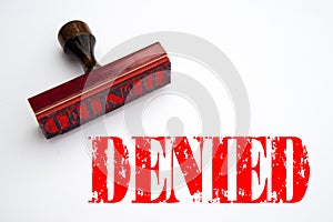 Rubber stamp with the word DENIED