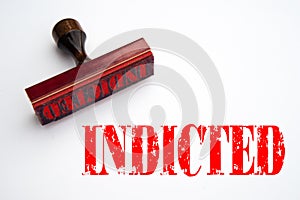 Rubber stamp with the word INDICTED