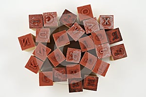 Rubber stamps of letters of the Latin alphabet in disarray photo