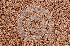 Rubber tile for sidewalks, brown color.