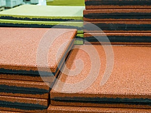Rubber tiles made from pressed crumbs