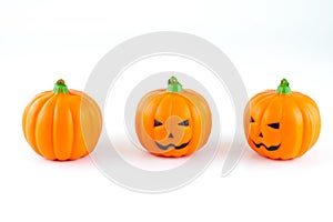 Rubber toy jack-o-lantern pumpkin for halloween decoration on white background