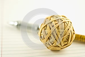 Rubberband Ball and Pen photo