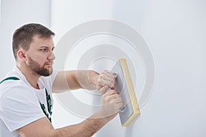 Rubbing down the wall