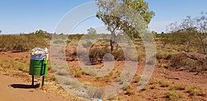 Rubbish bin trash dumpster waste recycle in outdoors outside outback Australia environment