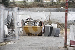 Rubbish and garbage in skip for disposal at dump site