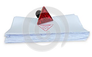 Rubble stamp and red recycle symbol stamp on the white paper waste paper pile isolated on white background with clipping path