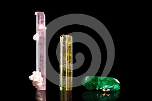 Rubellite, green and yellow Tourmaline, group of three mineral s photo